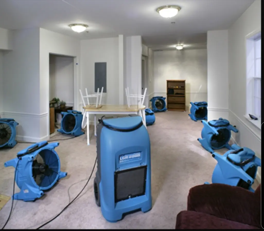Air movers and dehumidifier setup for Water Damage Restoration in Alexandria